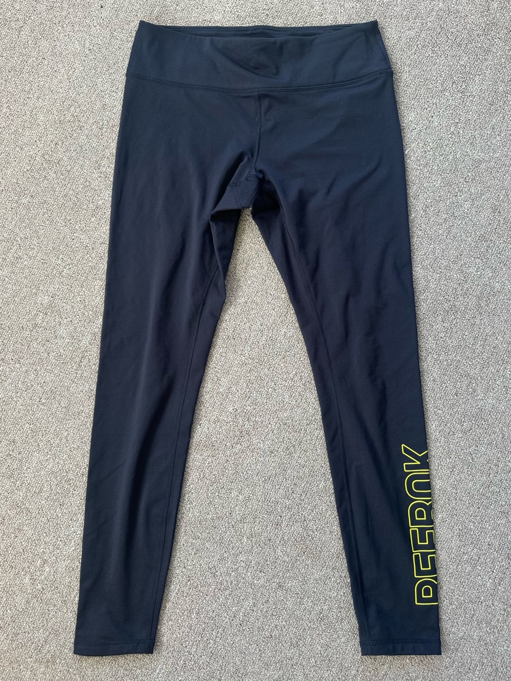 Reebok Medium Black Leggings with White Interior Print